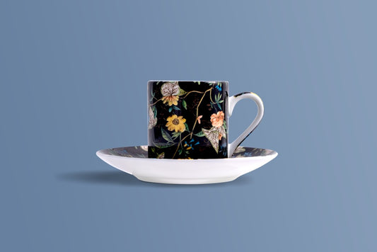 Botanica Noir bone china espresso cup with its matching saucer, dark botanical pattern.