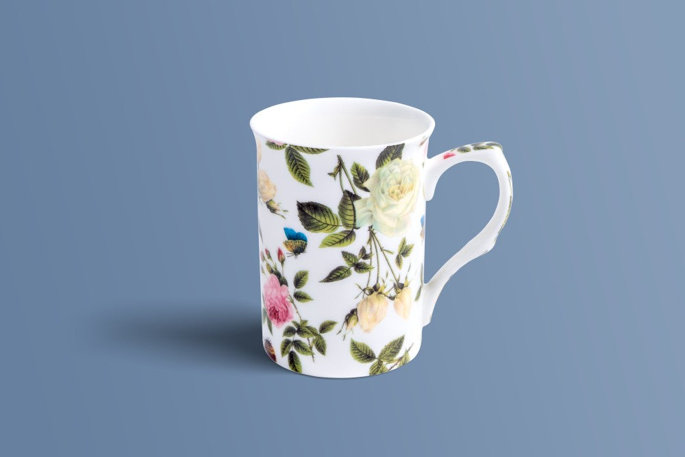 English Rose & Butterfly bone china mug with cream and blush roses, green leaves and a butterfly motif.