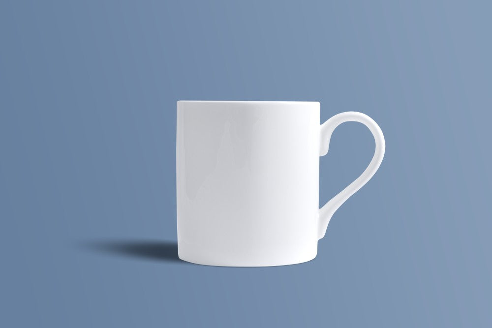 Plain white bone china coffee mug shown from the side, undecorated finish.
