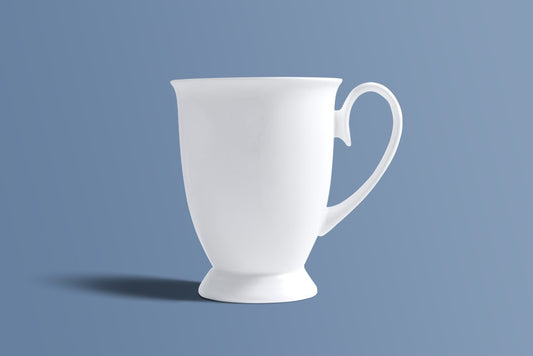 Plain white fine bone china footed mug by Otava, the undecorated version of the Botanica Blue design.