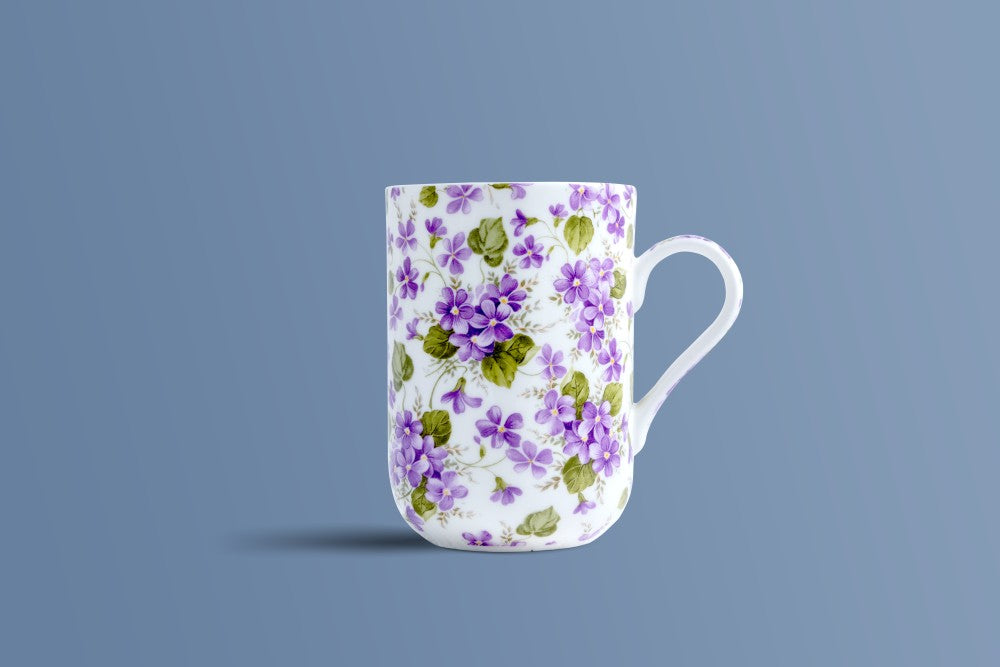 Tall tapered English Violet bone china coffee mug with an all-over violet floral pattern.