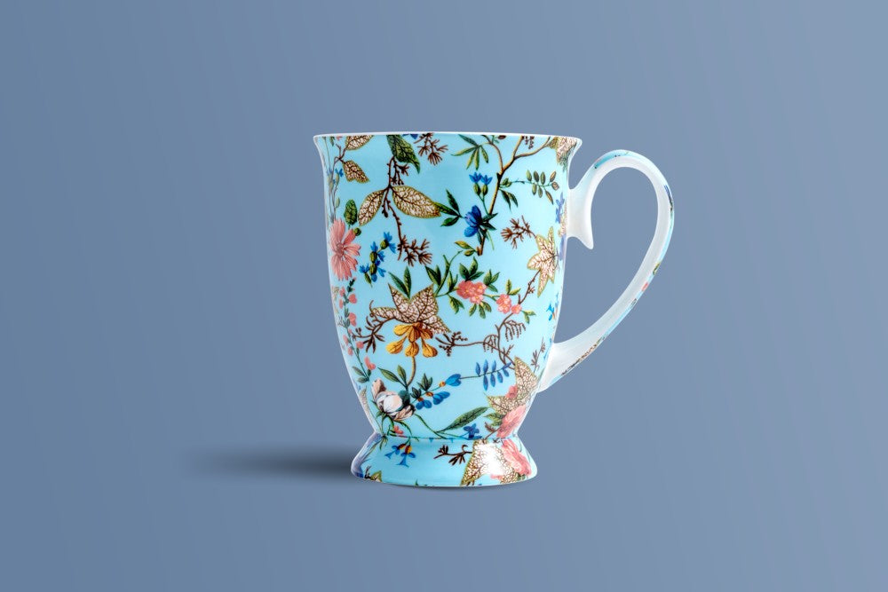 Botanica Blue footed fine bone china coffee mug by Otava, botanical print on a powder-blue ground.