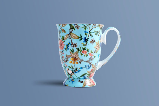 Botanica Blue footed fine bone china coffee mug by Otava, botanical print on a powder-blue ground.