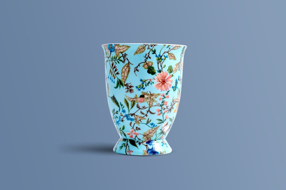 Botanica Blue bone china mug seen from the back, showing the full botanical print.