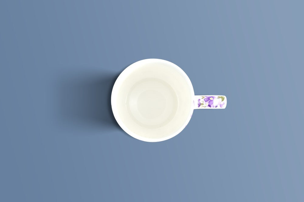 Top-down view of the English Violet bone china mug showing the floral patterned handle.