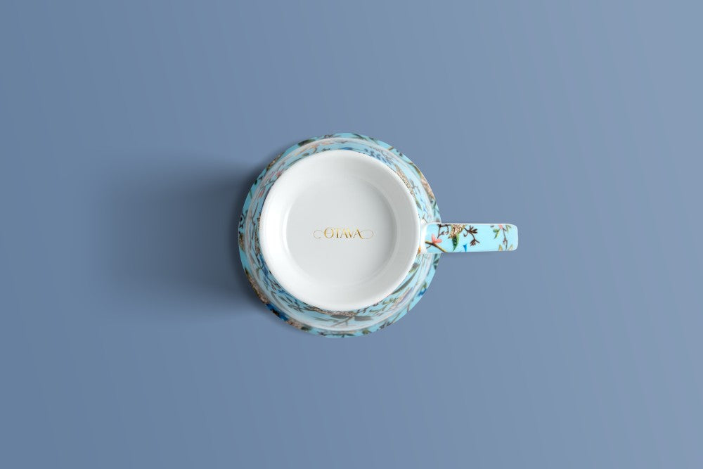 Botanica Blue bone china mug viewed from above, with the Otava mark inside the base.